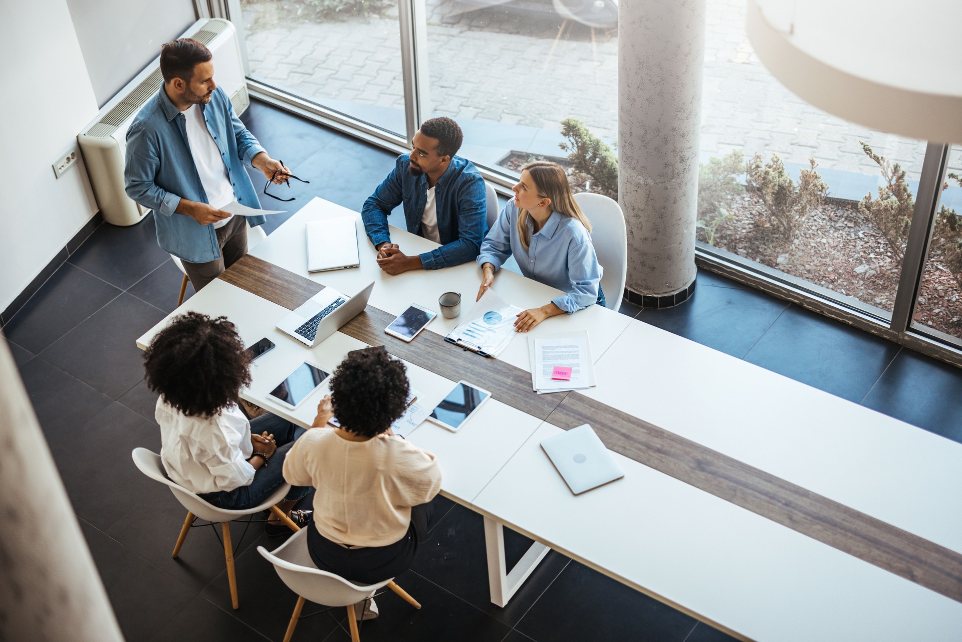 Business Team Meeting and Collaboration in a Modern Office Environment